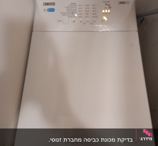 מכונת כביסה זנוסי עם כפתורים ותצוגה דיגיטלית
